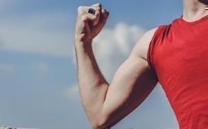 man rising arm
