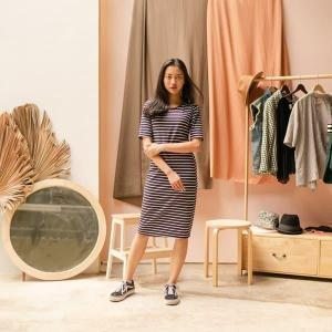 woman wears dress