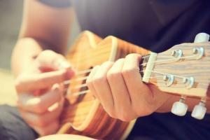 playing ukulele